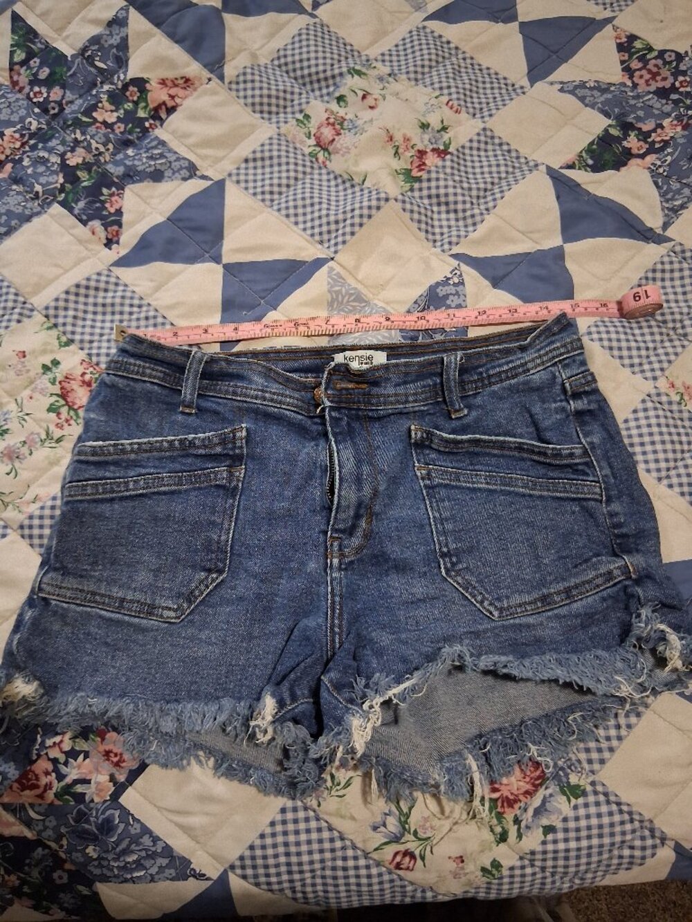 Kensie Jean shorts with frayed bottom.
